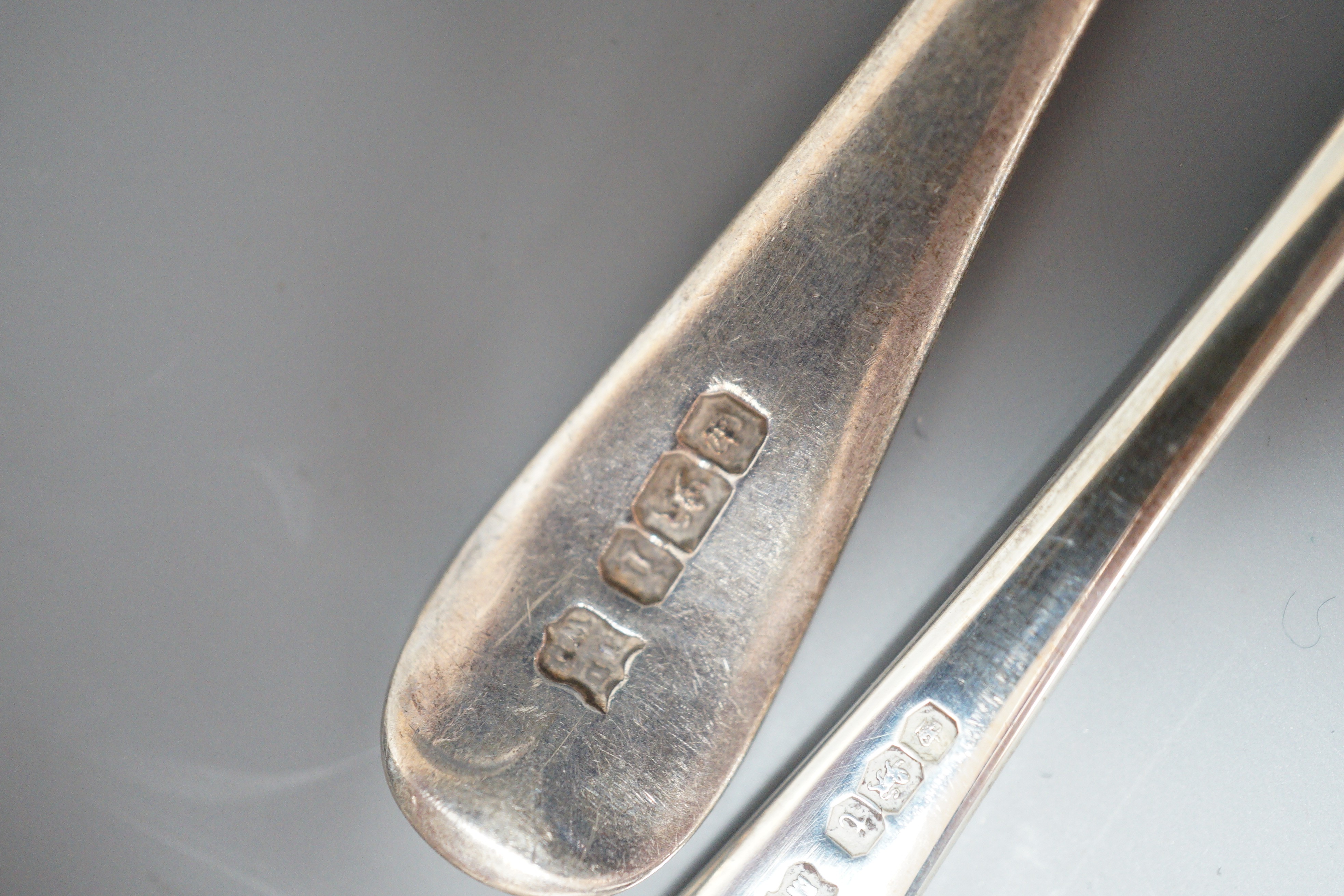A cased set of six silver 1930's silver Old English pattern teaspoons, Mappin & Webb, Sheffield, 1936 and three other silver teaspoons.